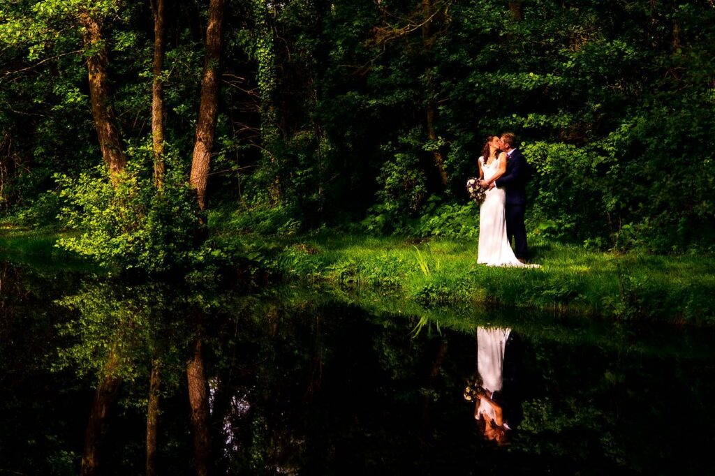 bride and groom on their wedding day at Hevingham Lakes
